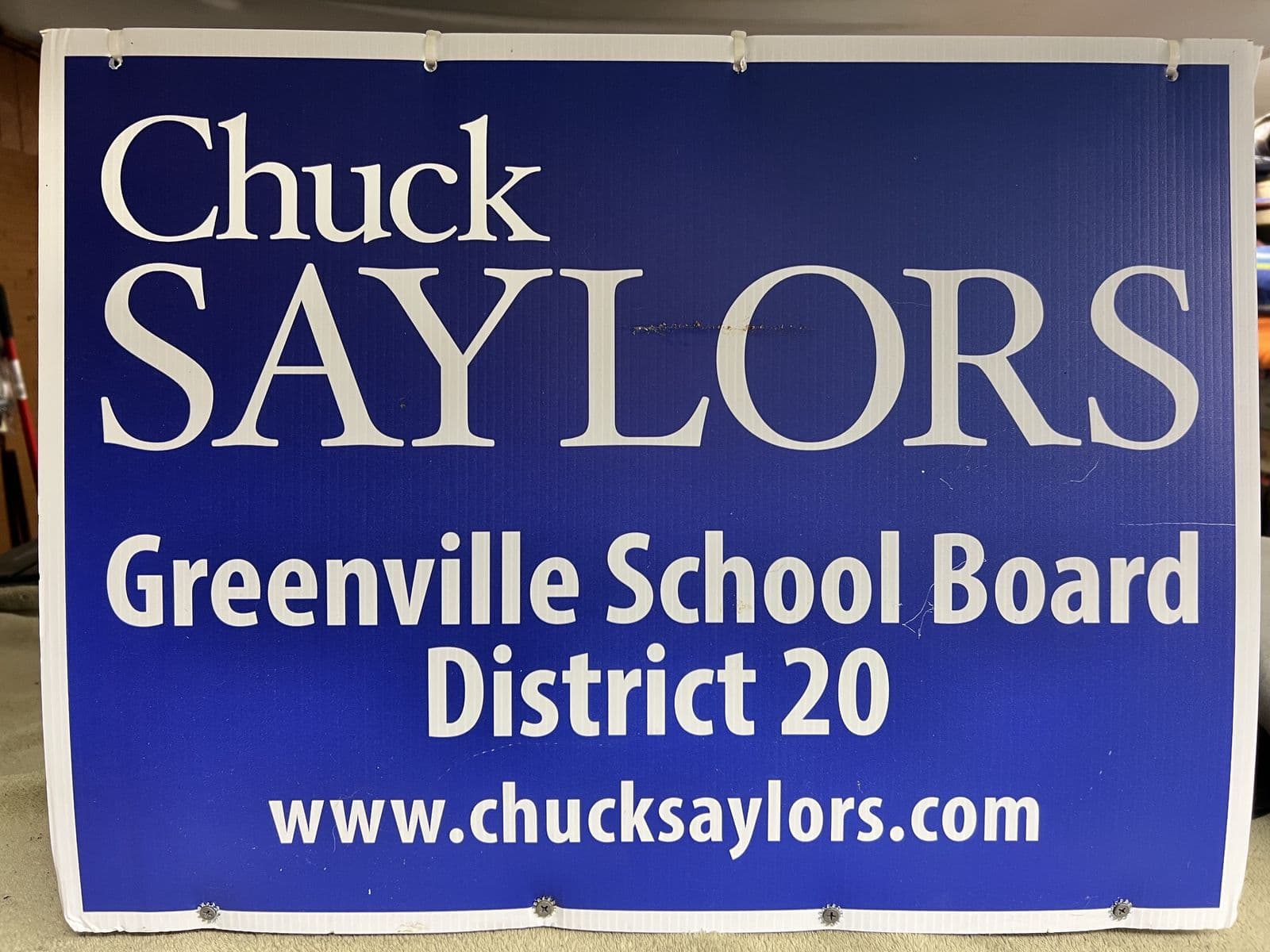 A Chuck Saylors for Greenville School Board District 20 campaign yard sign.