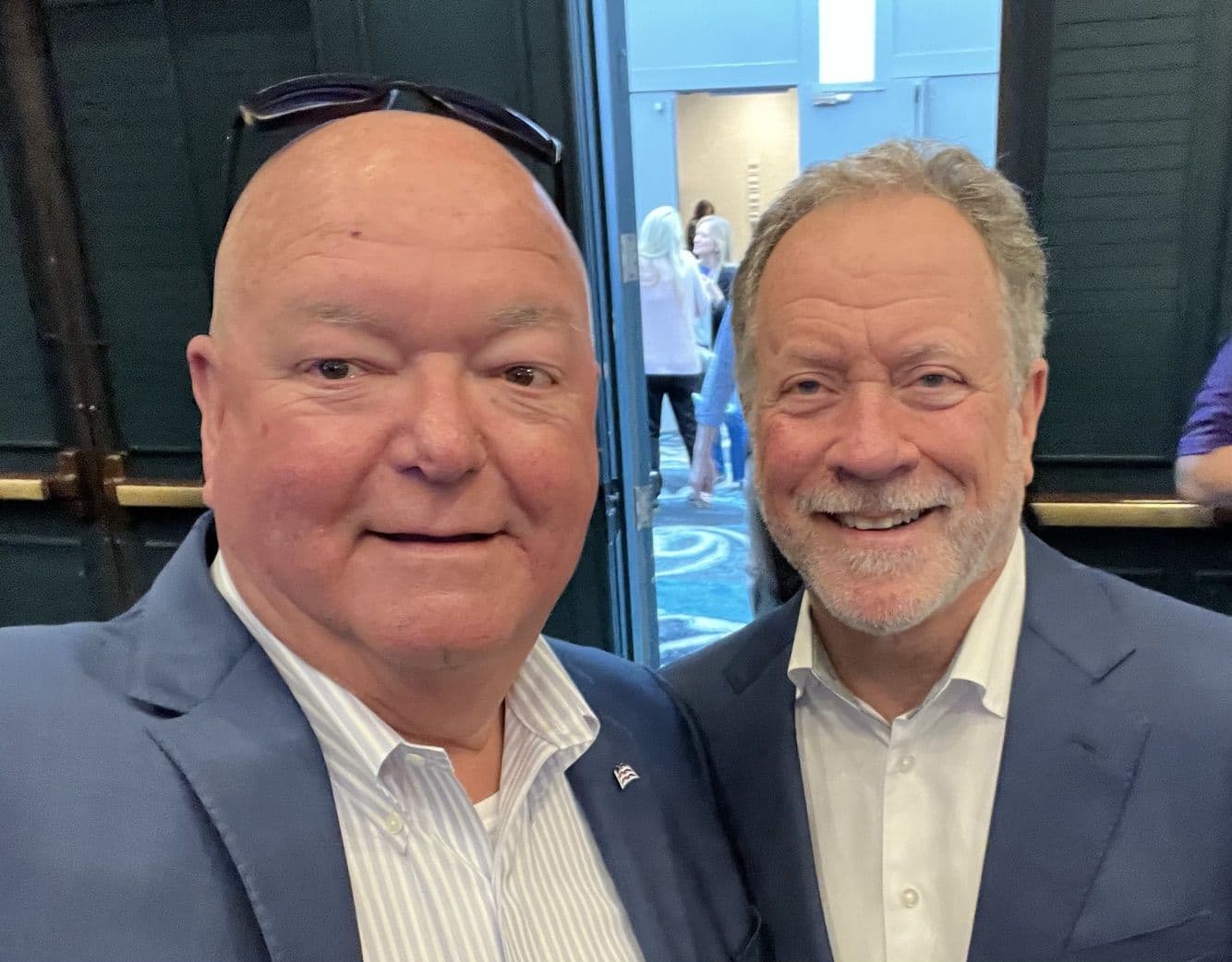 Chuck Saylors with another attendee at a conference.